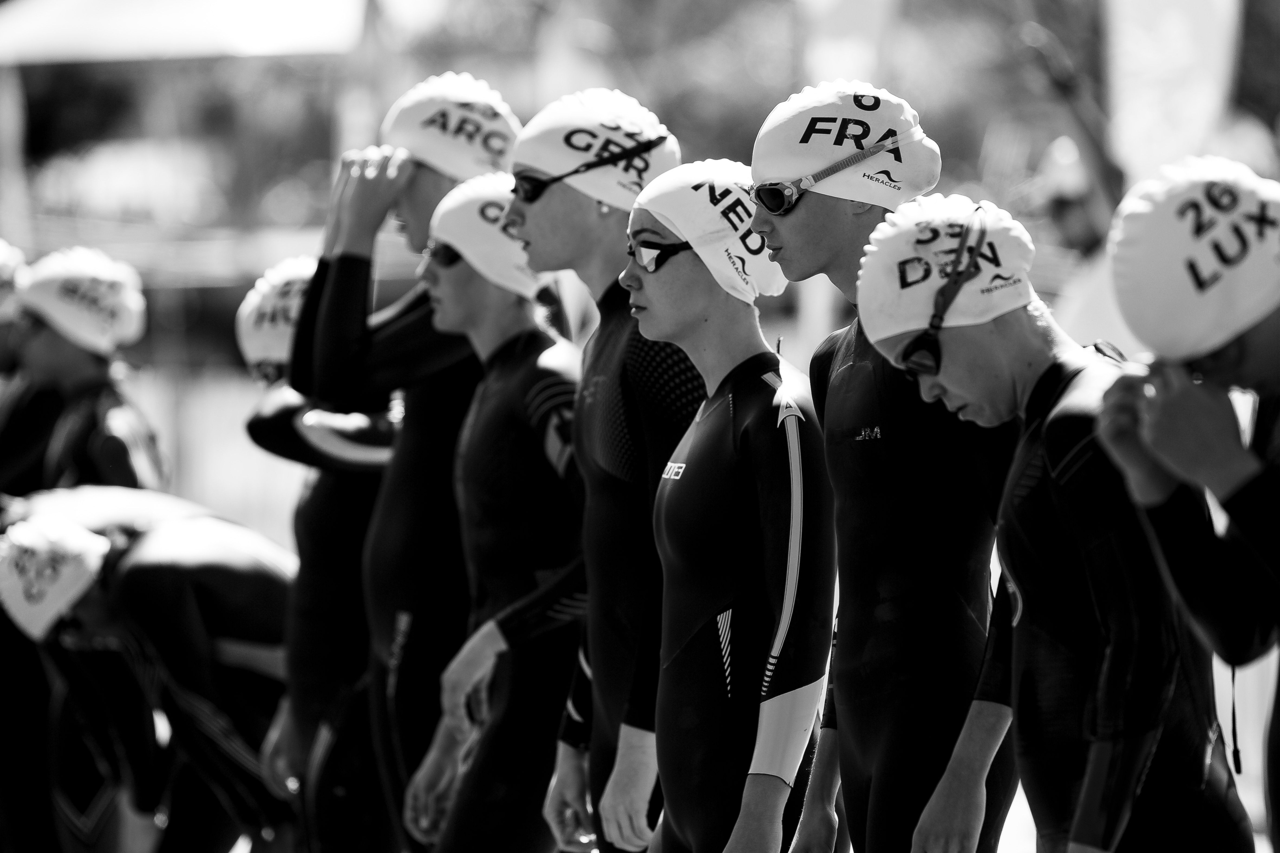 Triathlete in aero helmet with advanced aerodynamic cycling gear in Ha Long