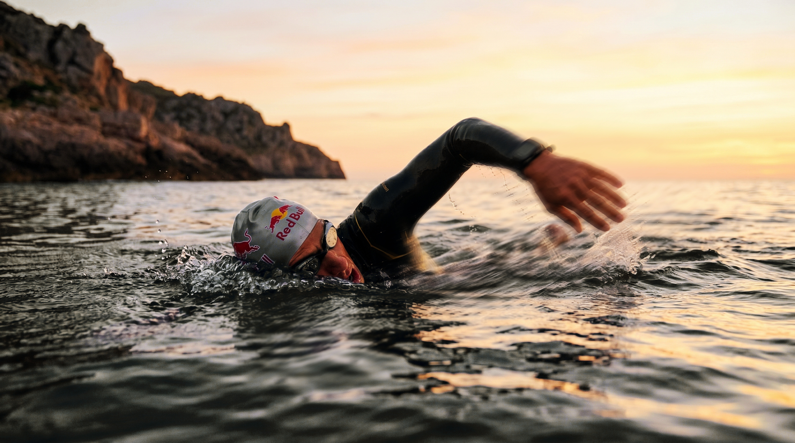 Open water swimmers navigating ocean swells in Phu Quoc